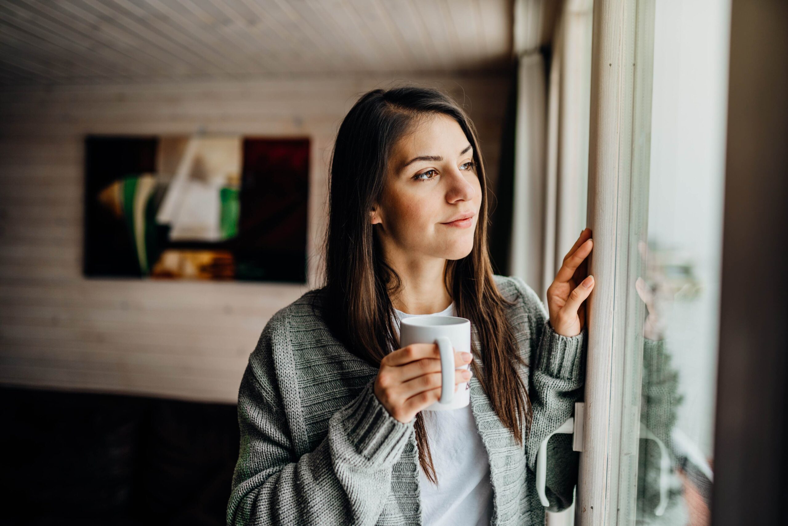 women looking out window