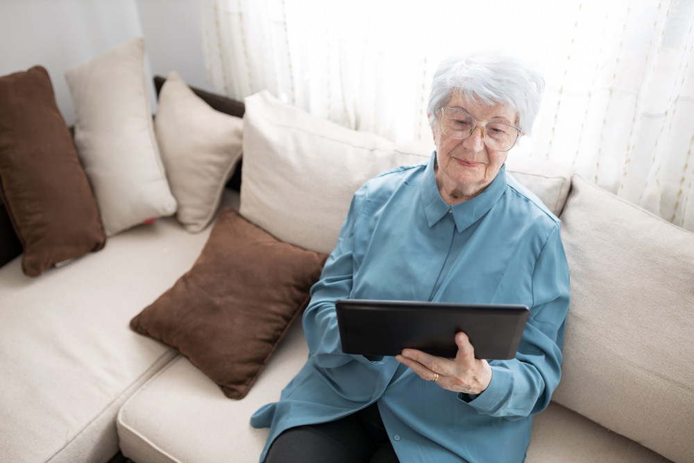 elderly lady on her tablet